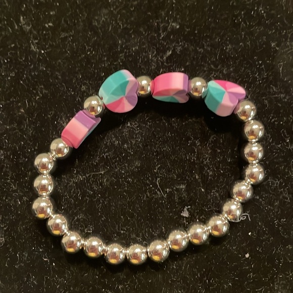 7” beaded stackable stretch bracelet with 23 silver beads & 4 heart shaped beads - Picture 9 of 13